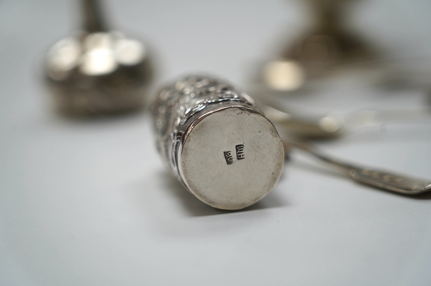 A George III silver snuffers stand, London, 1810, 22.8cm, together with sundry silver flatware, a silver sugar caster, a miniature Chinese white metal tea kettle by Wang Hing, lacking cover and one other item. Condition